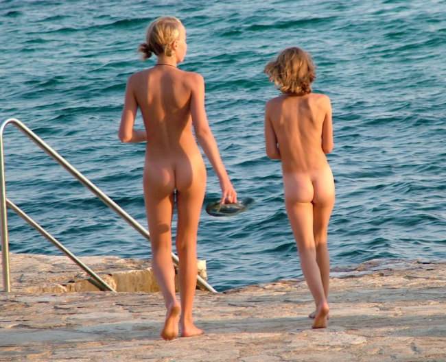 Teenagers nudists on a beach - to watch video